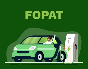 Propietario de taxi junto a un nuevo taxi eléctrico verde financiado por el programa FOPAT en Colombia.